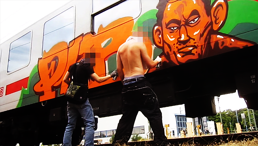 Train graffiti action — Agent Orange