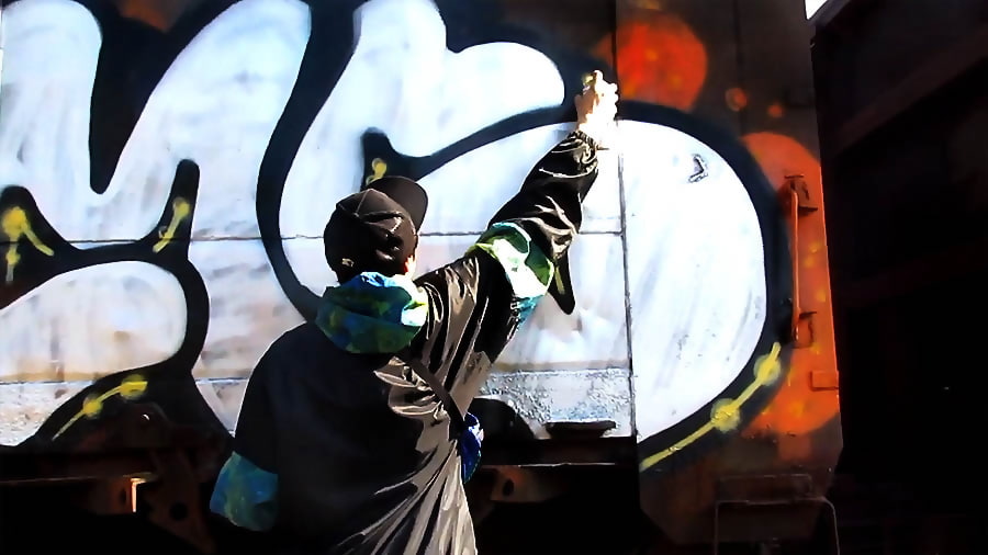 Freight train graffiti bombing